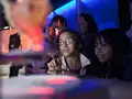 Girls watching 3D imaging demo
